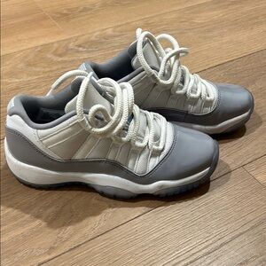 Jordan Gray and White Sneakers with Blue Accent